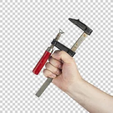 A hand holds a C-clamp with a red handle. Photos