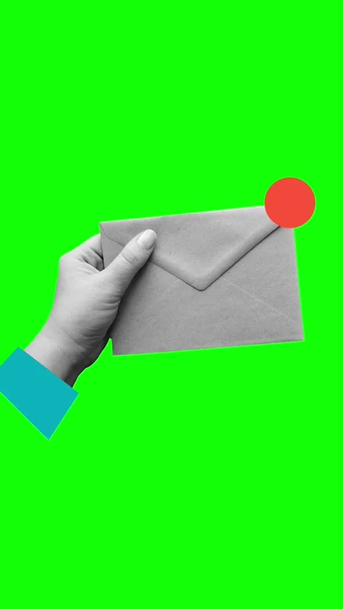 A hand holds a closed envelope with an unread message. Letter in hand Stock Footage 337397941