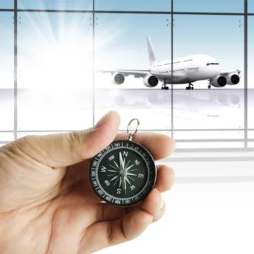 Hand holds the compass showing the right direction Stock Illustration