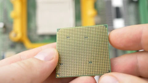 Hand Holds CPU Chip Processor Stock Footage 108371632