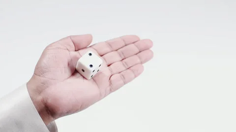 Hand Holds A Dice with number Two Vídeo Stock 248741452