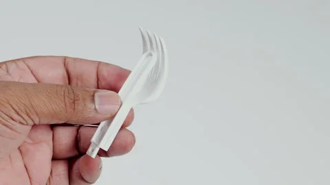 Hand Holds Folding Plastic Fork Video stock 248709100