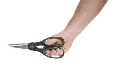 Hand holds kitchen scissors on a white background Stock Photos