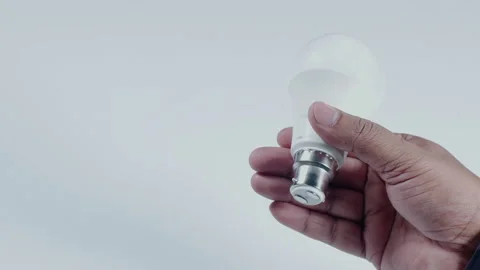 Hand Holds Led Light Bulb Stock Footage 248685001