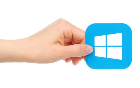 Hand holds Microsoft Windows icon Stock Photos