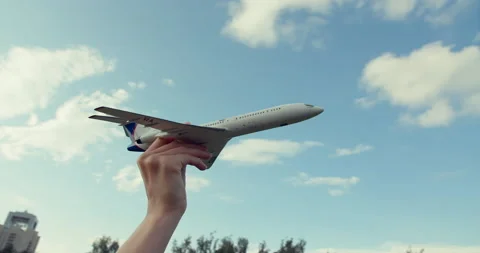 Hand holds a model airplane Video stock 154801343