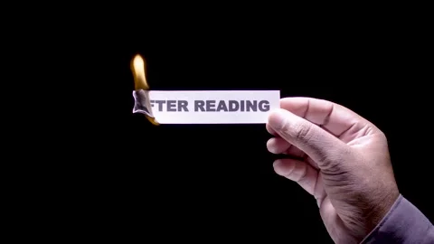Hand Holds Paper Burning After Reading Stock Footage 248536360