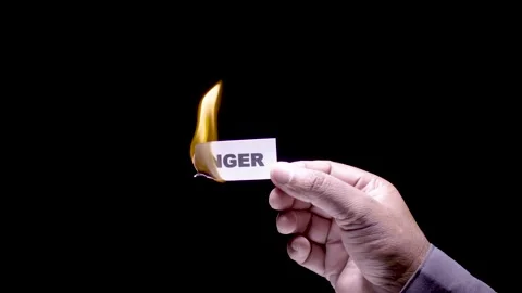 Hand Holds Paper Burning Anger Stock Footage 248536895