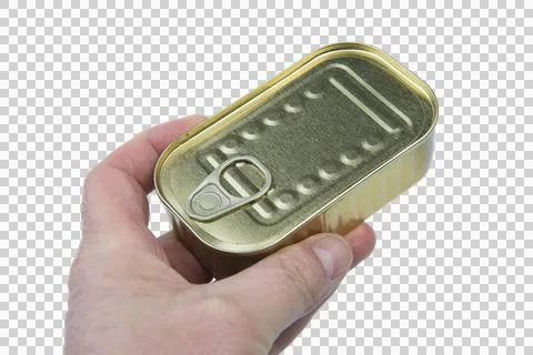 A hand holds a rectangular, gold-colored tin Stock Photos