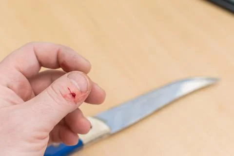 The hand that holds a sharp knife Stock Photos