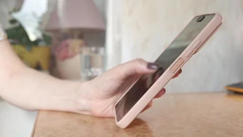 Hand holds smartphone and quickly presses finger on smartphone screen Stock-Footage 278046458