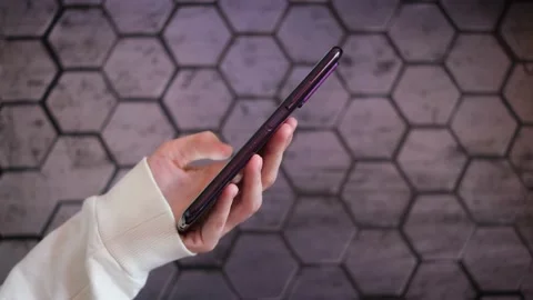 Hand holds smartphone. Stock Footage 151512214