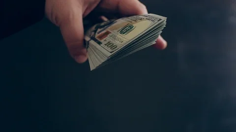 Hand holds some dollars banknotes Video stock 86322872