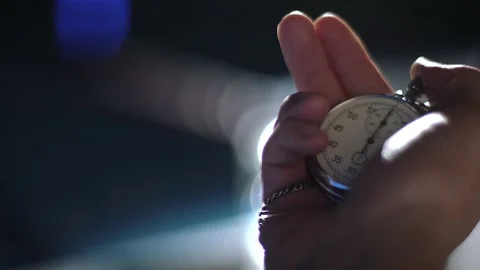 Hand holds stopwatch in the pool Stock Footage 132893754