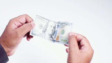 Hand Holds Us One Hundred Dollar Bill Stock Footage 248708283