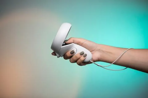 Hand holds vr remote controller, Wireless joystick for next generation video Stock Photos