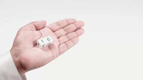 Hand Holds White Dices One And Six Stock Footage 248742952