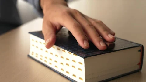 Hand on holy bible with cross as taking pledge loyalty. Burgeoning Stock Footage 266451450