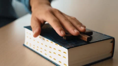 Hand on holy bible with cross as taking pledge loyalty. Burgeoning Stock Footage 277026406