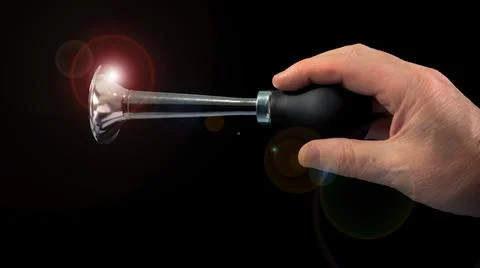 Hand honking on black background Stock Photos