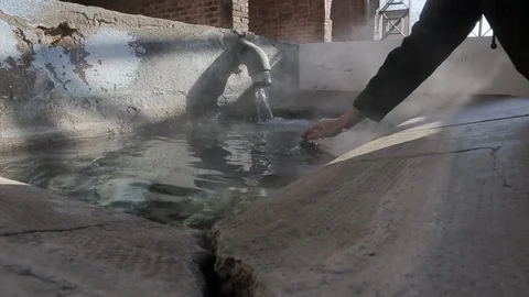 Hand in the hot springs Stock Footage 123155402
