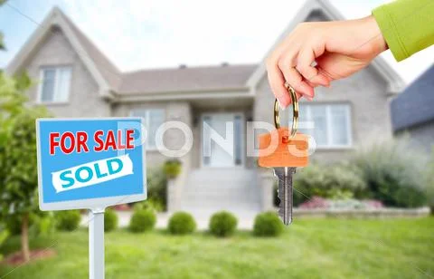 Hand with a house keys. Stock Photos