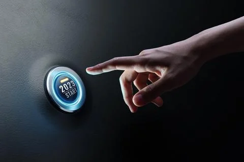 Hand of human going to press on start engine car button on black leather. Stock Photos