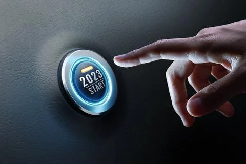Hand of human going to press on start engine car button on black leather. Stock Photos