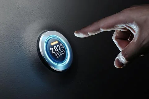 Hand of human going to press on start engine car button on black leather. Stock Photos