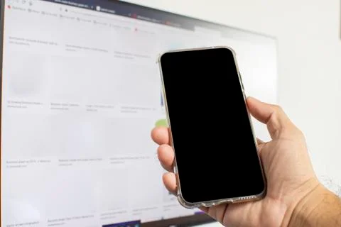 Hand of human using smartphone. Stock Photos