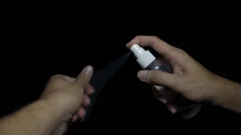 Hand Hygiene with Hand Sanitizer plus Black Background Stock Footage