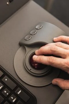 Hand on an industrial control panel Stock Photos