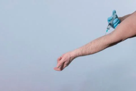 Hand injecting Stock Photos