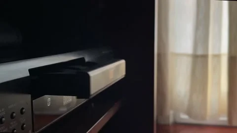 A hand insert one cd into the cd player Stock Footage 196798834