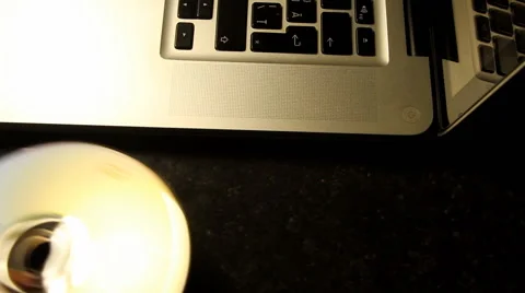 Hand Inserting DVD In Laptop, Media, Technology, Energy, High Angle Shot Stock Footage 42849034