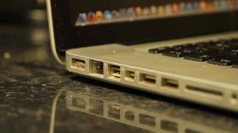 Hand Inserting Ethernet Cable Into Laptop, Media, Technology, Energy, Side Shot Stock Footage 42849019