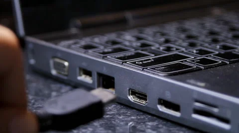 Hand Inserting HDMI Cable Into Laptop, Media, Technology, Video, Side Shot Video stock 41989872