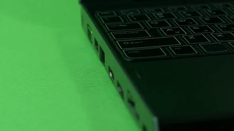 Hand Inserting Internet Cable In Laptop, Green Screen, Close-Up, Detail Stock Footage 73783453