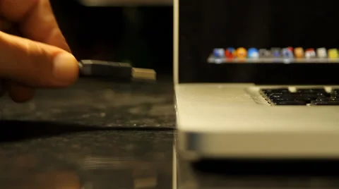 Hand Inserting USB Cable Into Laptop, Media, Technology, Energy, Front Shot Stock Footage 42848699