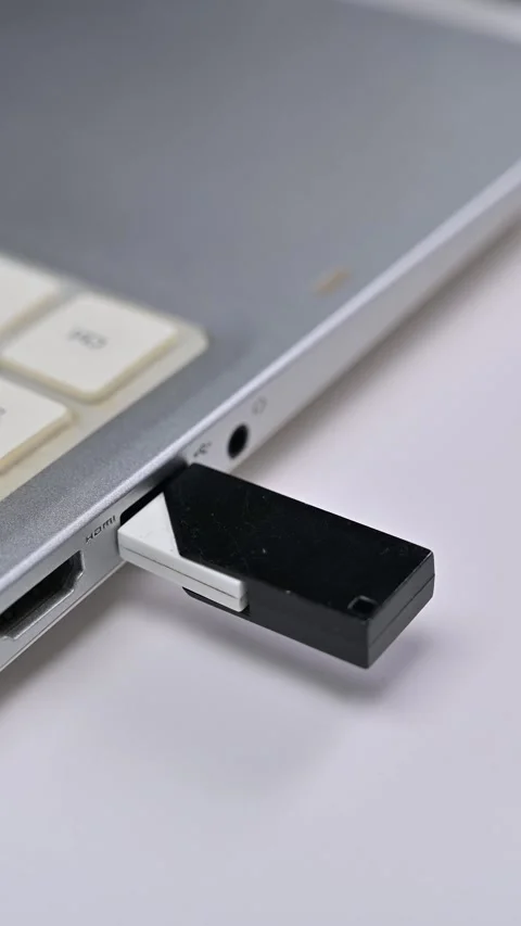 Hand Inserting USB Flash Drive Into Computer Laptop. Stock Footage 280906942