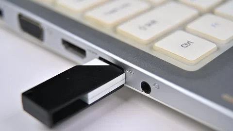 Hand Inserting USB Flash Drive Into Computer Laptop. Stock Footage 280906943
