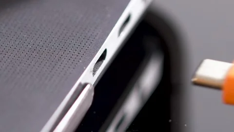 Hand inserting USB Type C wire into laptop computer. Fast Charging Type Stock Footage 150557078