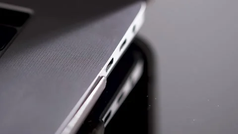 Hand inserting USB Type C wire into laptop computer. Fast Charging Type 動画素材 150557217