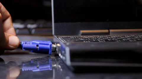Hand Inserting VGA Cable Into Laptop, Media, Technology, Video, Front Shot Video stock 41990021