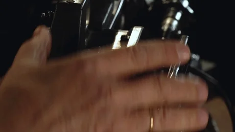 Hand inserts a cartridge into the camera Vídeo Stock 114509529