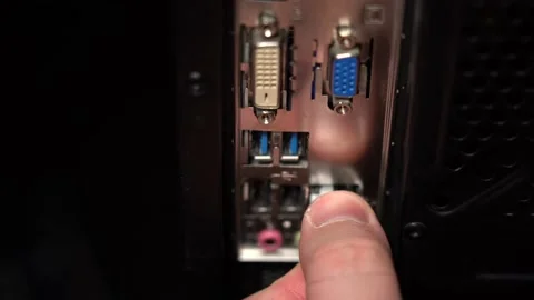 Hand inserts a lan wire into the computer. Stock Footage 147660795