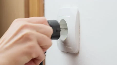 The hand inserts the plug into the plug. Close-up. Circuit. Stock Footage 162879275