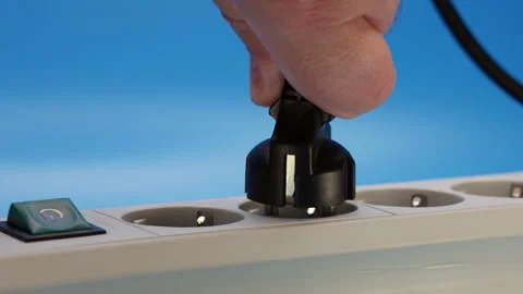 Hand Inserts The Plug Into The Socket Of The Extension Cord. 4k, 60 FPS, ProRes. Stock Footage 241173314