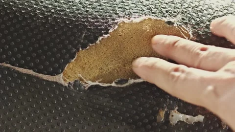Hand Inspecting Damaged Motorcycle Seat With Ripped Leather Upholstery Textur Vídeos de archivo 338224975