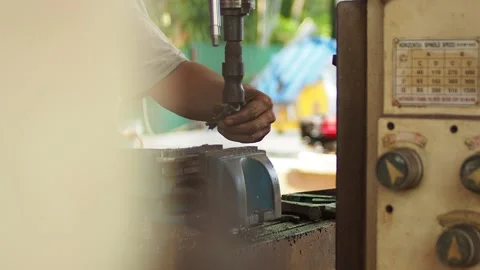 Hand installation drilling machine in the workshop2 Stock Footage 136867919